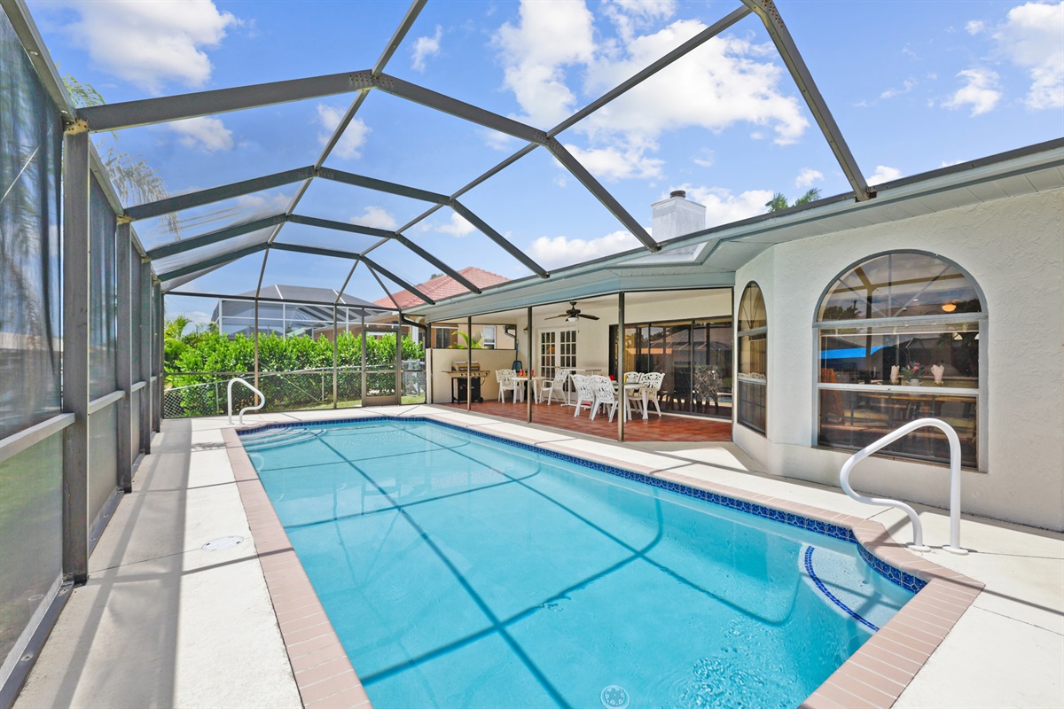 Poolside paradise under a screened lanai