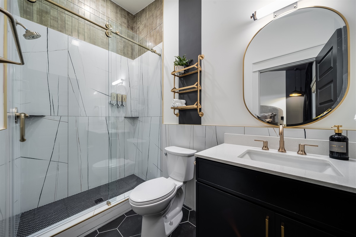 Refresh and recharge in your private en-suite bathroom, complete with a contemporary walk-in shower."
