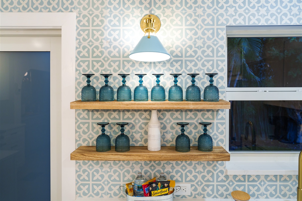 It&rsquo;s all in the details. Elegant shelving and curated glassware add a touch of luxury to your stay.