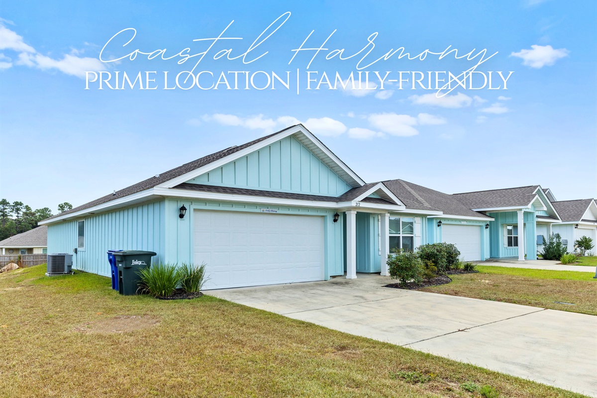 Charming coastal retreat just minutes from the beach. Spacious driveway and welcoming front porch set the tone for your family getaway.