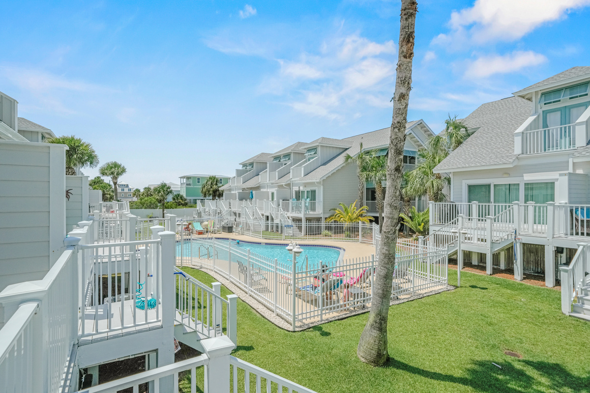Wake up to pool views from the private balcony and enjoy peaceful mornings with your favorite drink