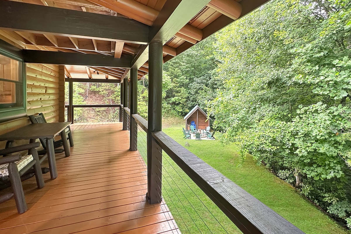 Porch: Enjoy serene views while sipping your morning coffee on a spacious timber deck!