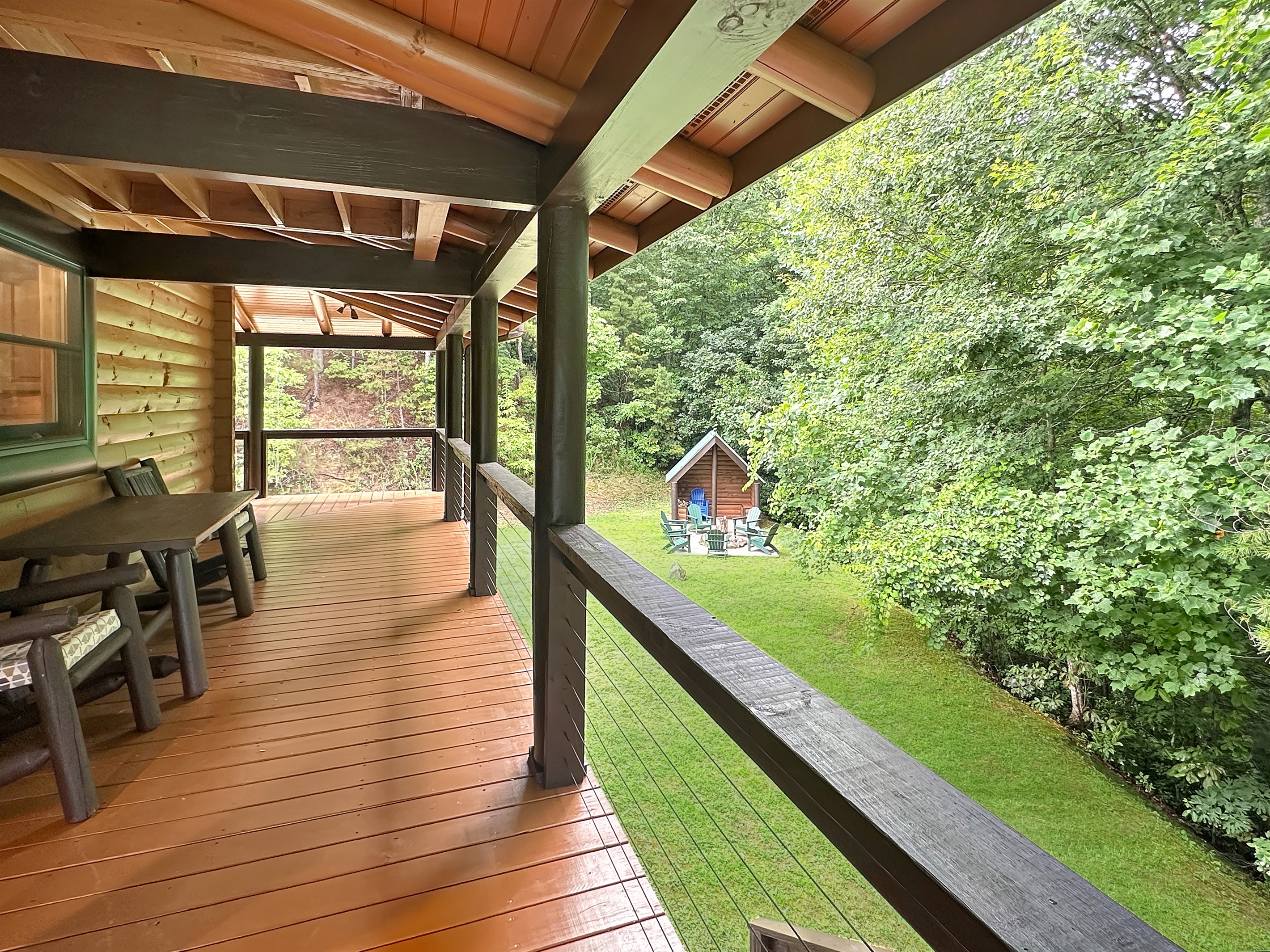 Porch: Enjoy serene views while sipping your morning coffee on a spacious timber deck!