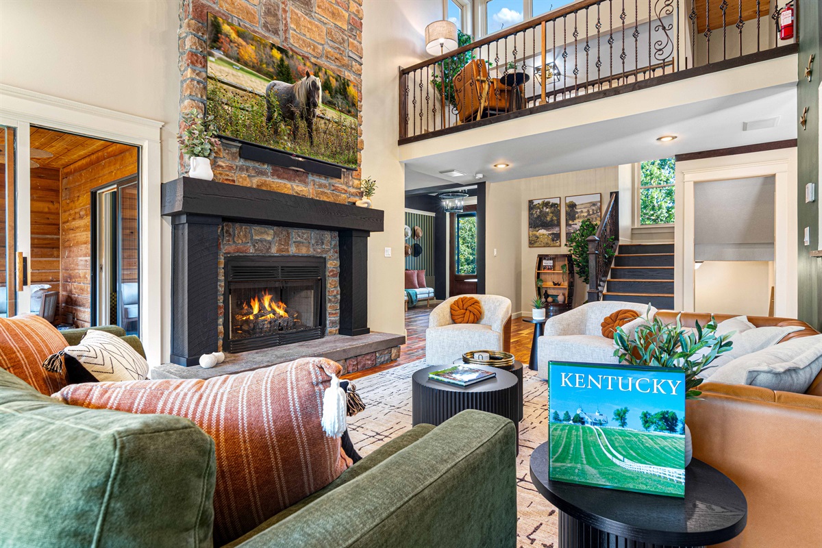 Main living room with easy on gas fireplace