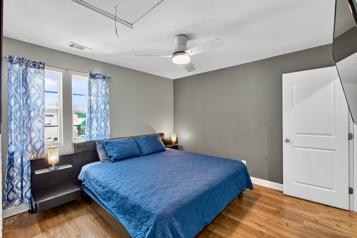 A comfortable king bed with small details that matter, like USB plugs on the nightstands.