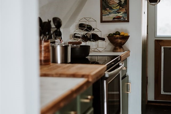 Kitchen. Has everything you need like pots and pans, bakeware, utensils and spices/oils.