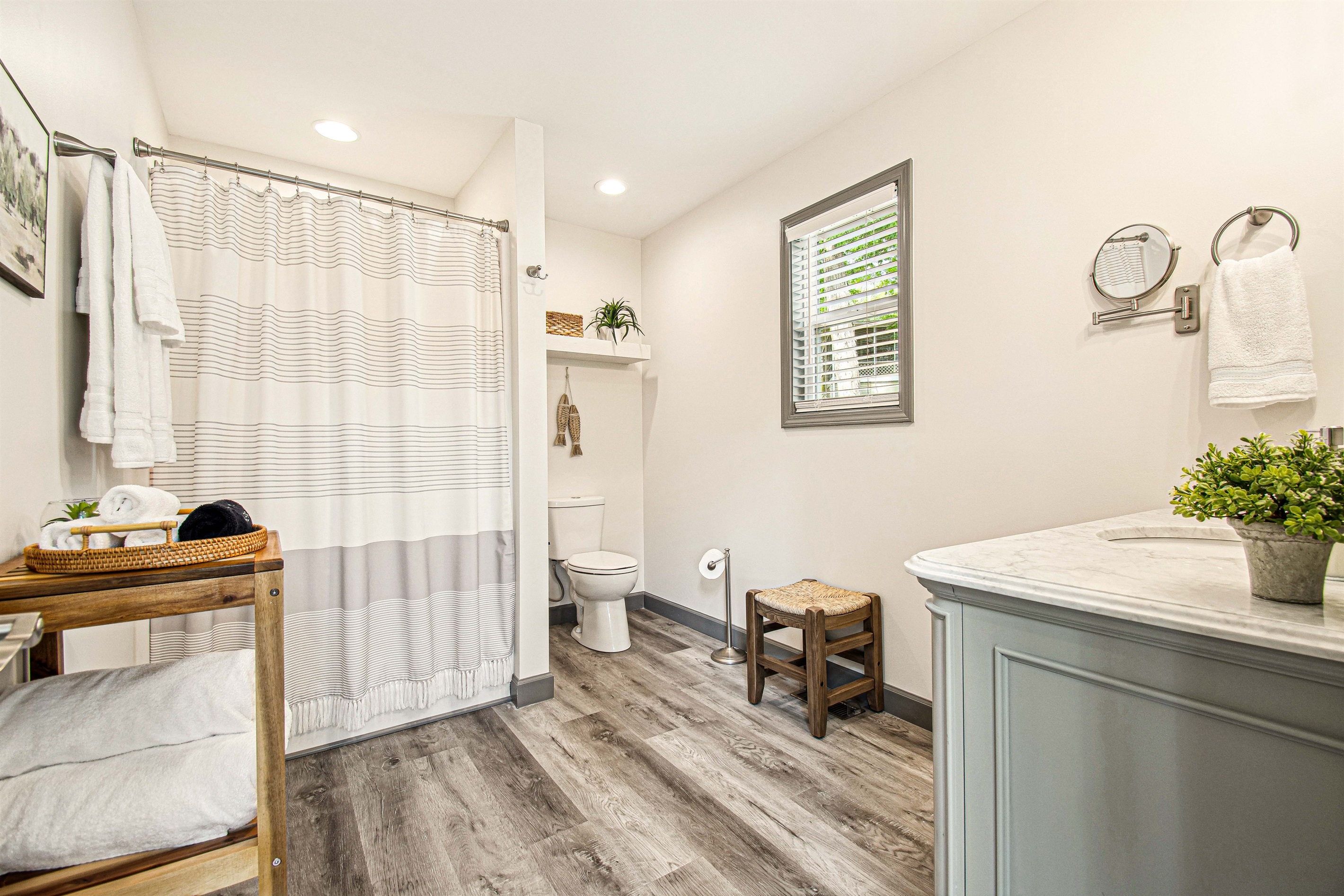 Our spacious guest bathroom is complete with a new seated shower and complimentary toiletries.
