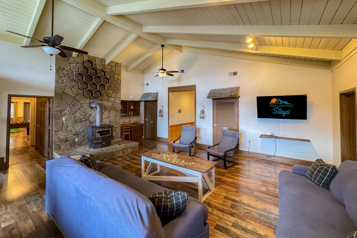 upper level great room. Please note the wood stove is not a listed amenity or available for use.