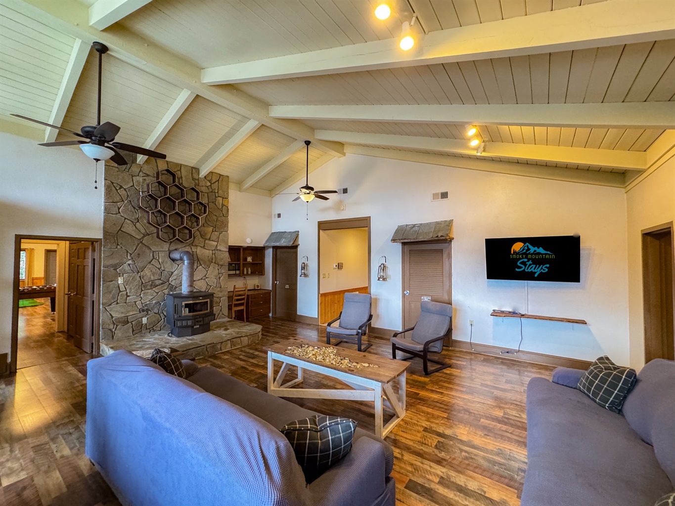 upper level great room. Please note the wood stove is not a listed amenity or available for use.