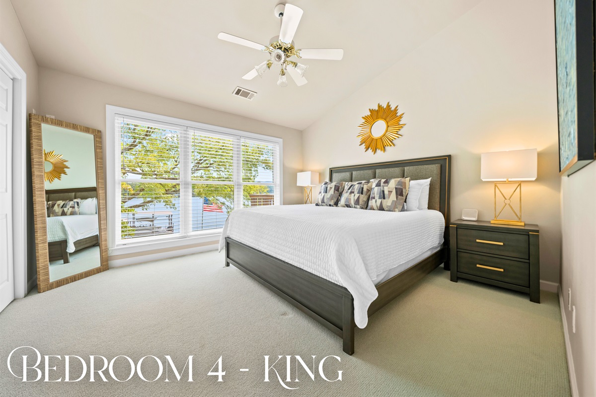 Bedroom 4 (King): Vaulted ceilings and sunlight galore make this room feel like a retreat.