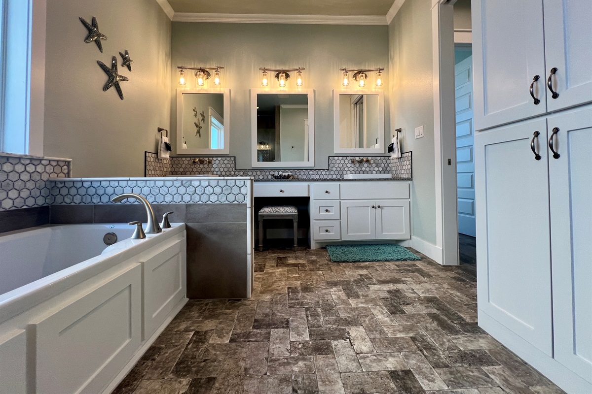 Crystal Paradise Bathroom 2 Ensuite: Private primary ensuite with spacious dual vanity and sleek, contemporary shower design.