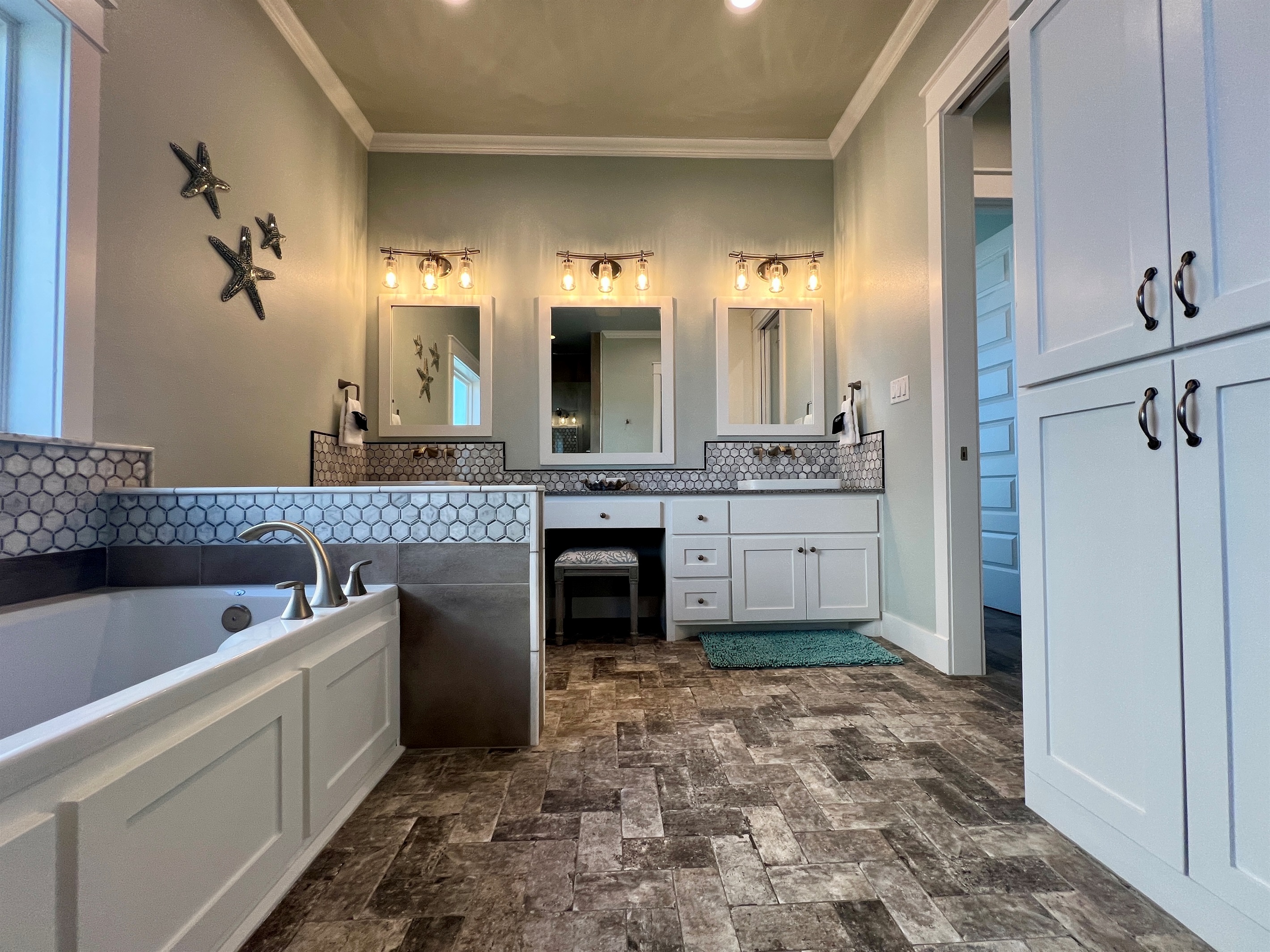 Crystal Paradise Bathroom 2 Ensuite: Private primary ensuite with spacious dual vanity and sleek, contemporary shower design.