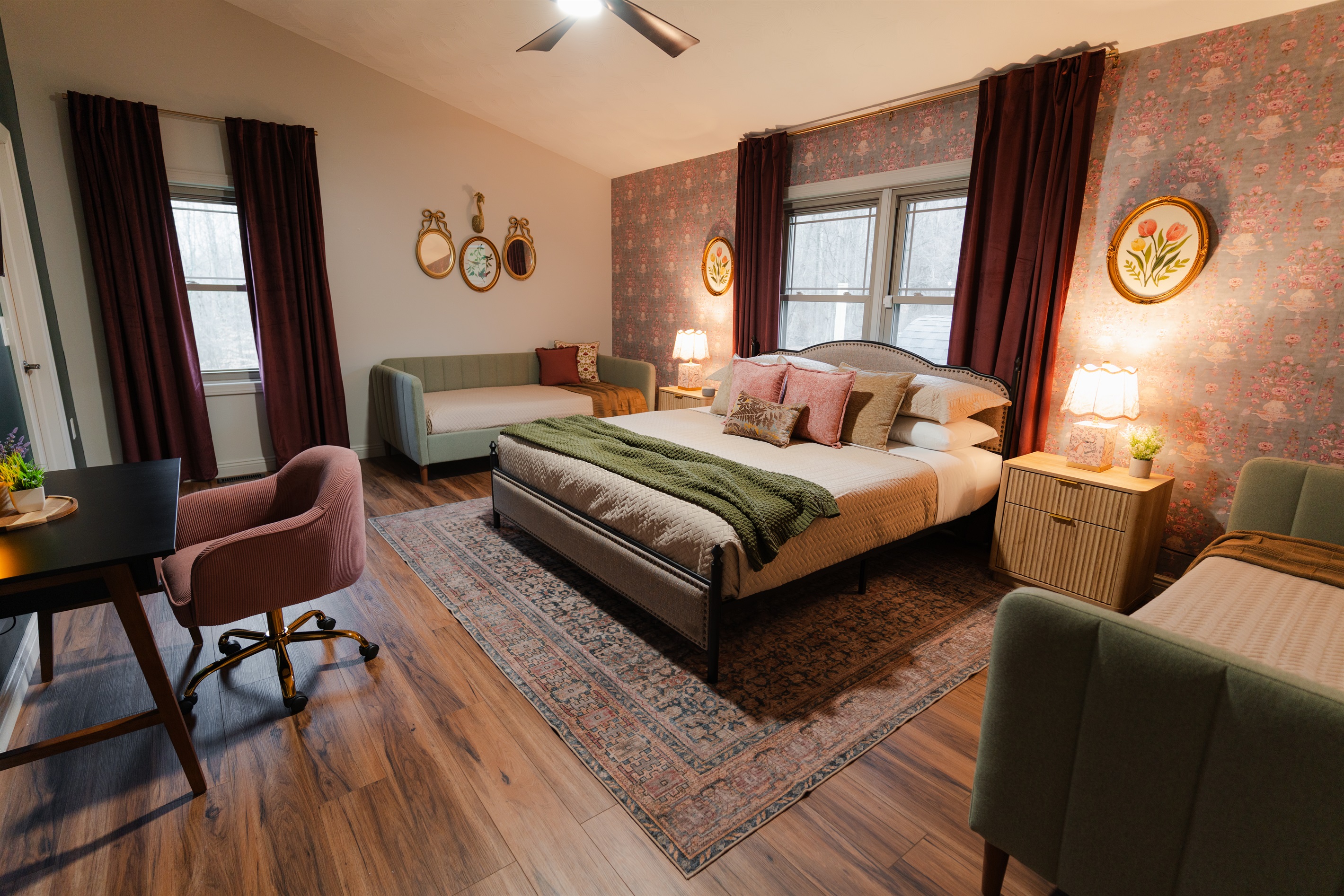 A comfortable bedroom with a large bed and added sleeping space to fit your group with ease.