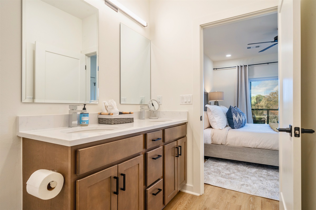 En-Suite Primary Bathroom with Double Sinks and Separate Tub/Shower