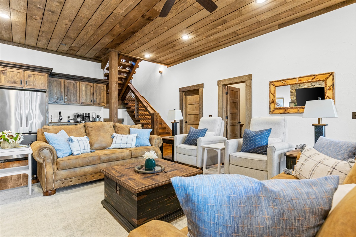 Step into a whole new atmosphere in the downstairs living room, designed for family fun and relaxation. 