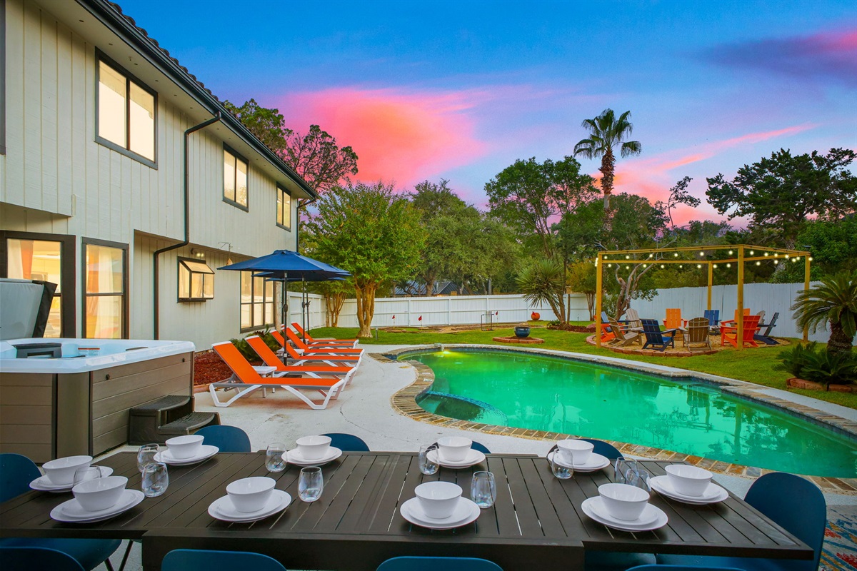 Enjoy al fresco meals by the pool in a resort-style setting.