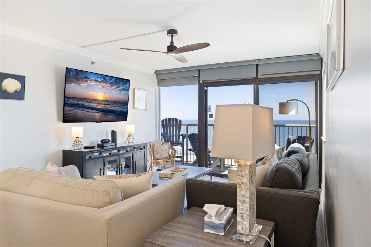 Living room with ocean views and smart tv