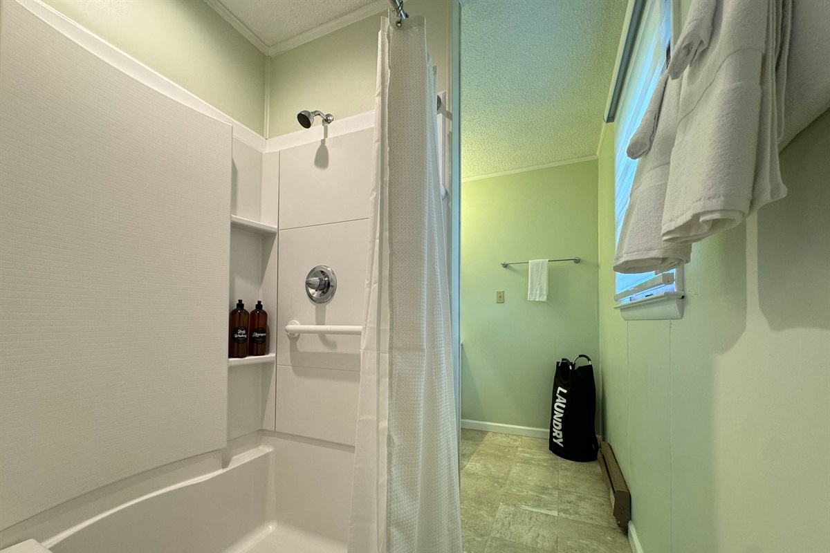 The master ensuite bathroom features an easy access shower complete with a shower chair and grab bar!