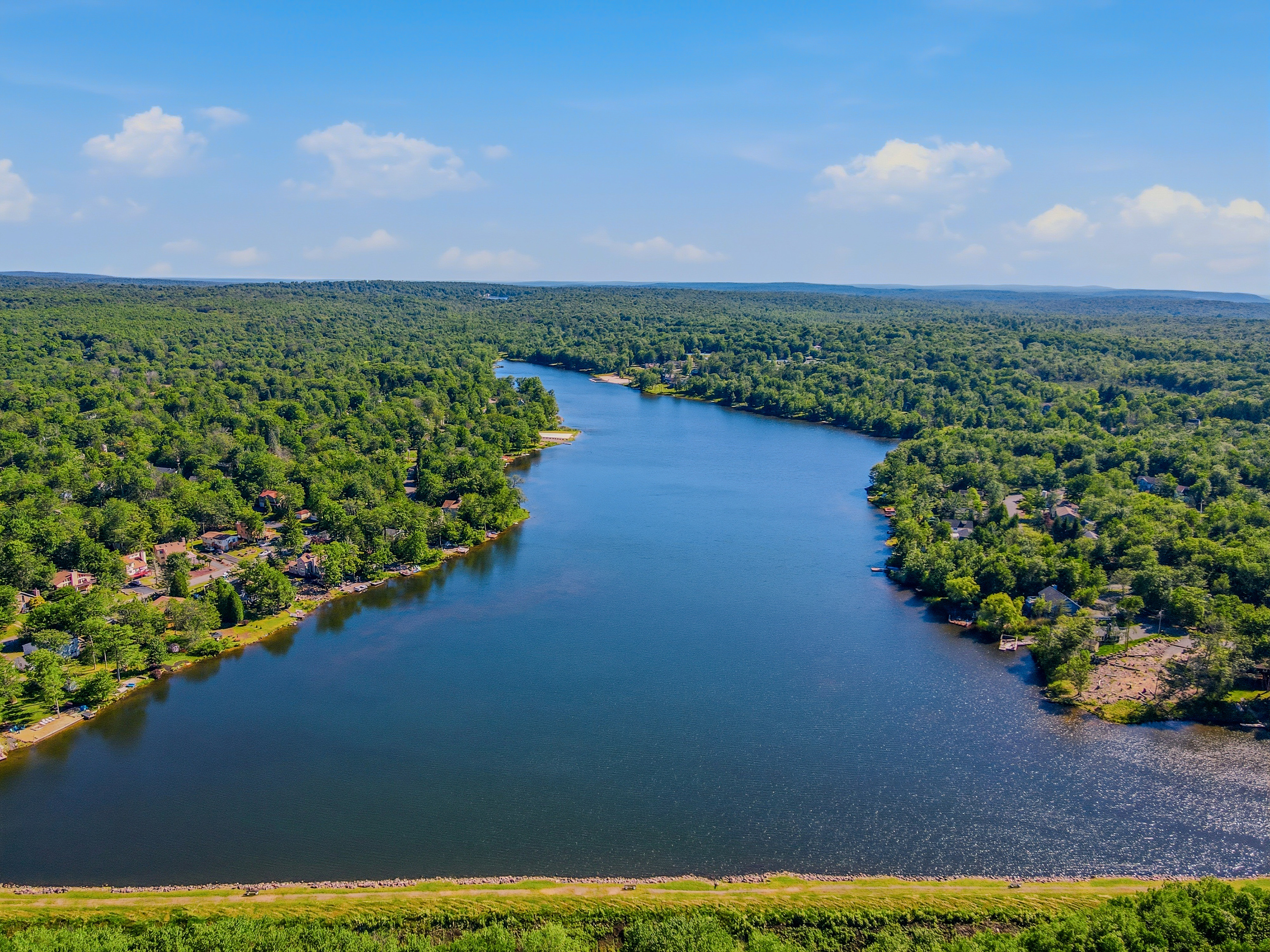 Lake Carobeth from altitude — pristine water, wooded shores, and open sky