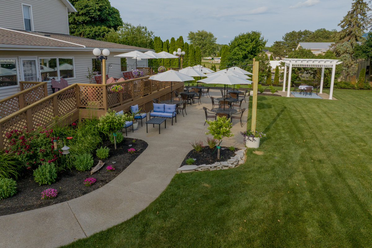 Stroll through beautifully landscaped gardens featuring roses, flowering plants, romantic seating areas, and picturesque outdoor spaces designed for relaxation