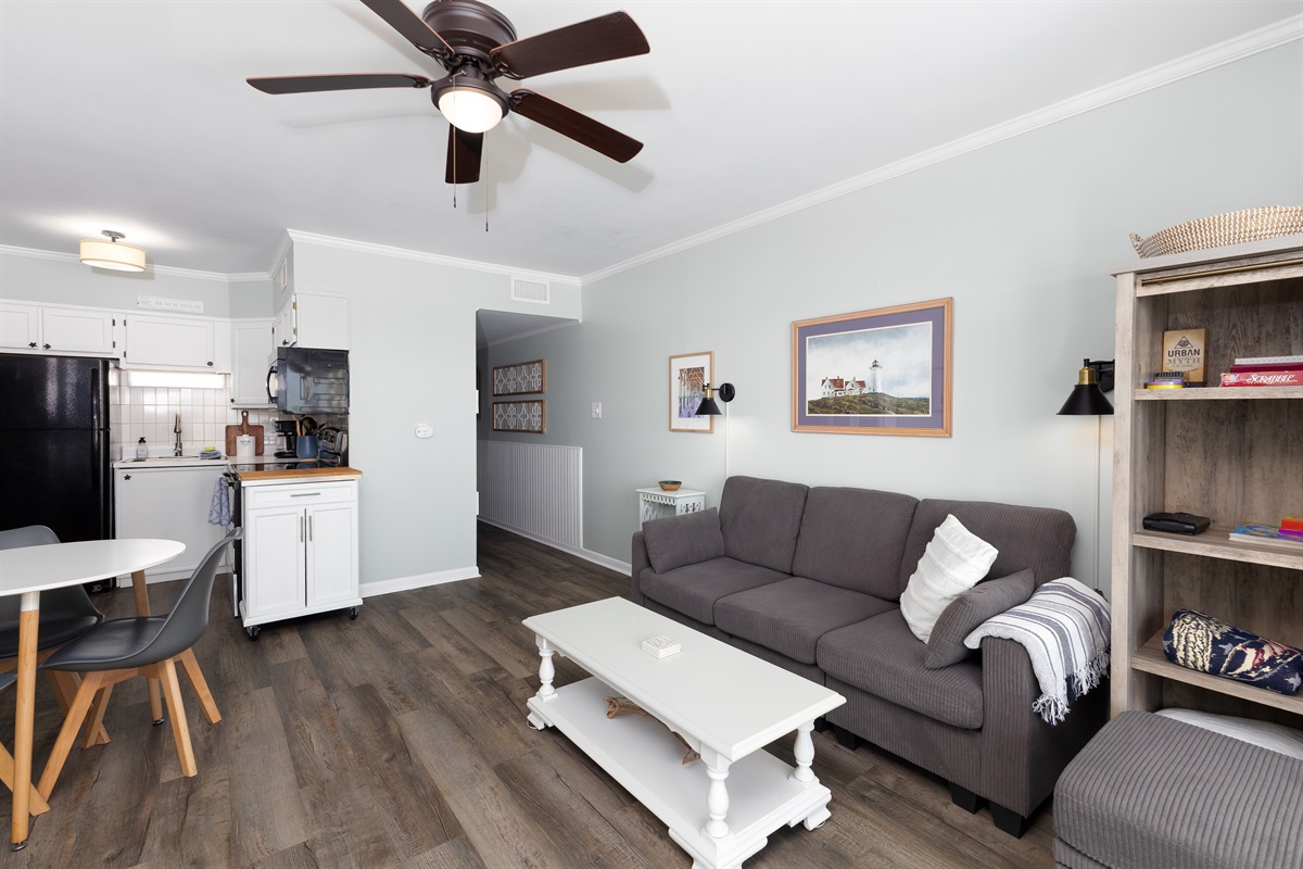 The living room seamlessly flows into the kitchen