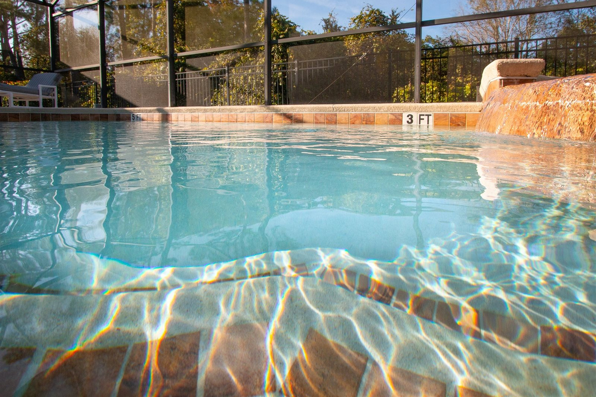 Relax by your private screened patio pool