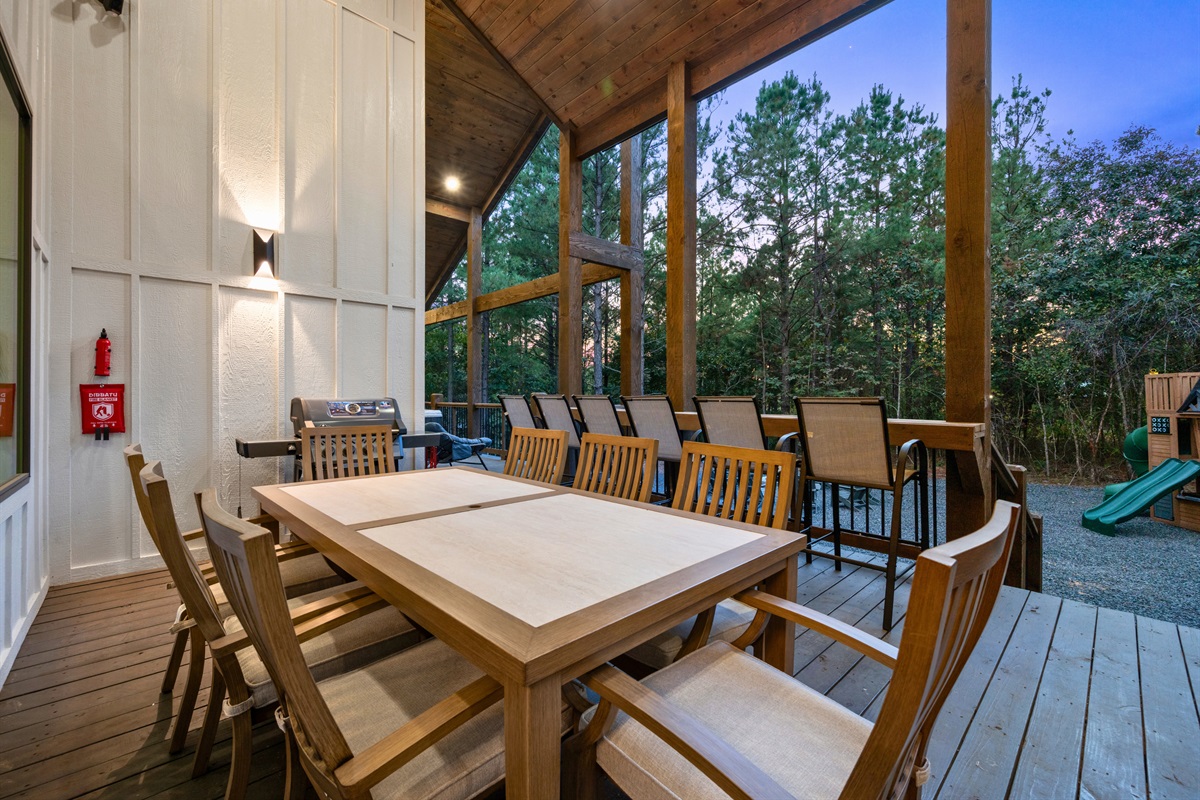 Enjoy outdoor meals together on the covered deck while soaking in the peaceful forest surroundings.