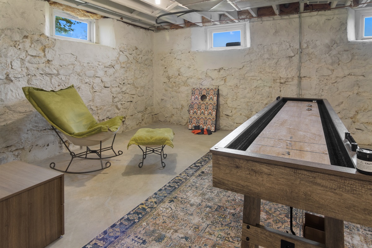 Shuffleboard and lounge space lower level