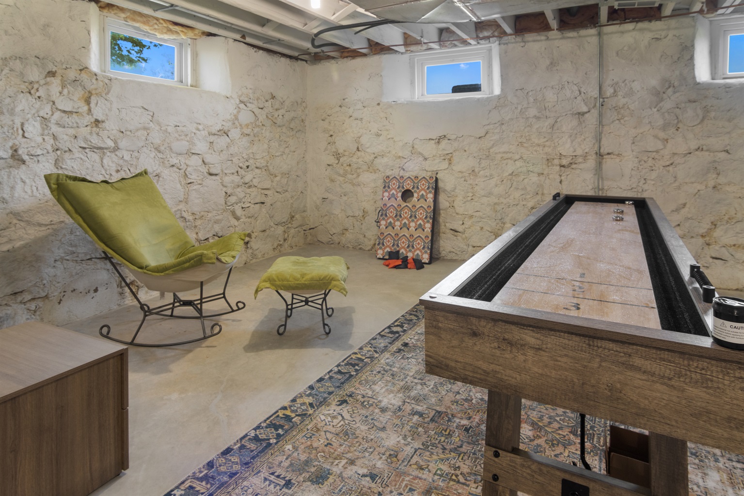 Shuffleboard and lounge space lower level