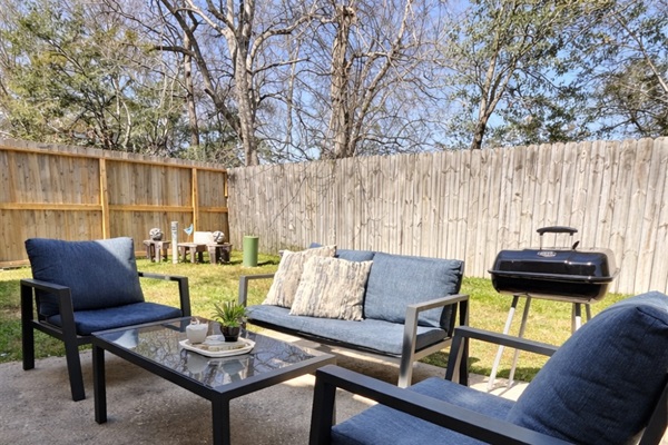 Spacious outdoor area for BBQs, games, and relaxation.
