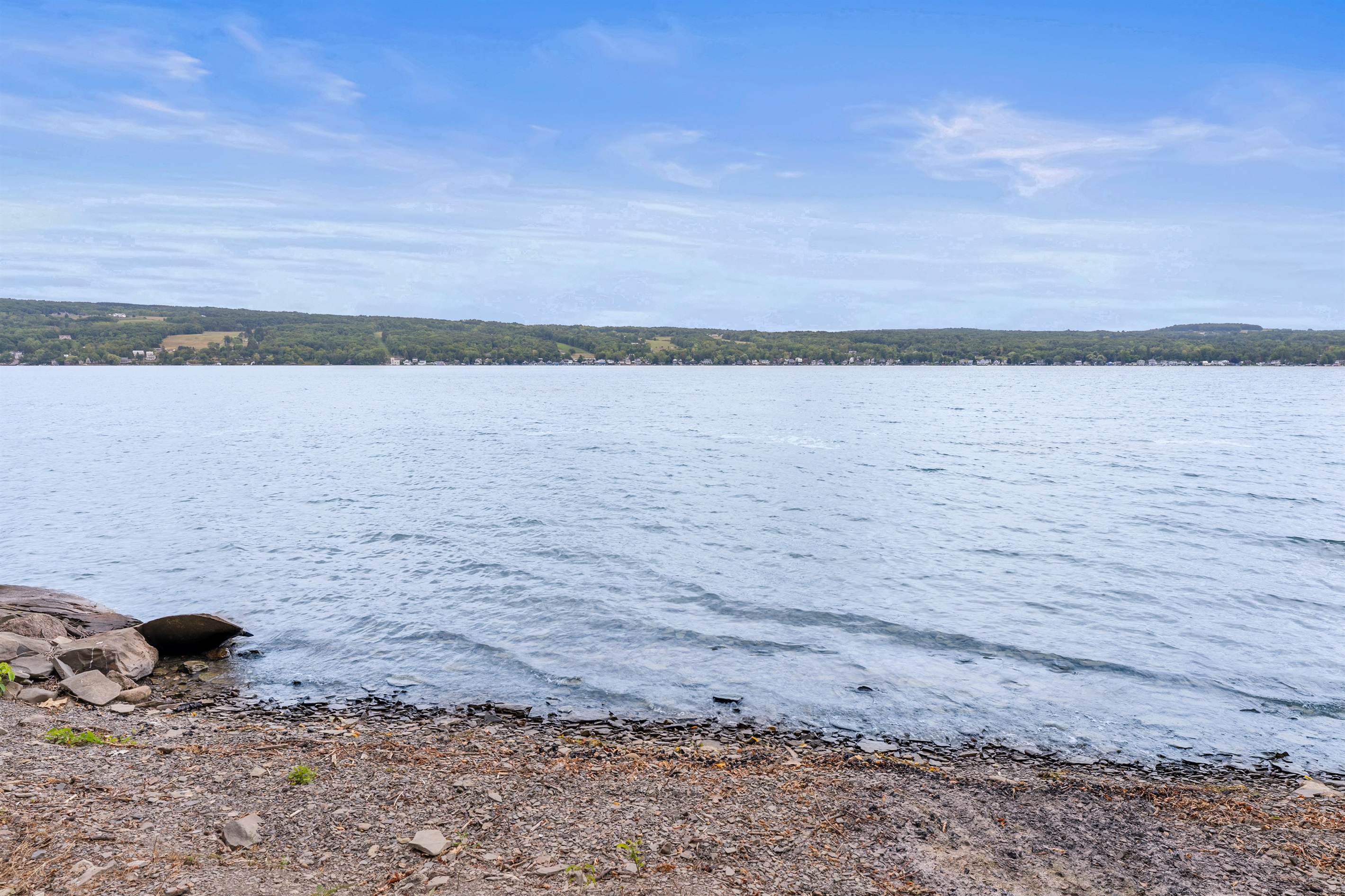 Expansive water views showcase the beauty of the Finger Lakes, a perfect backdrop for unforgettable moments.