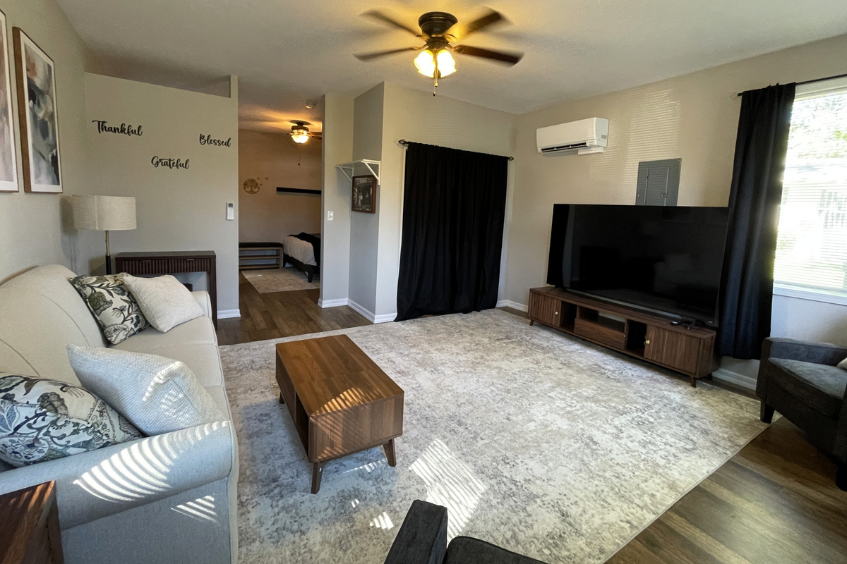 Spacious and Airy Living Room with 75" Smart TV
