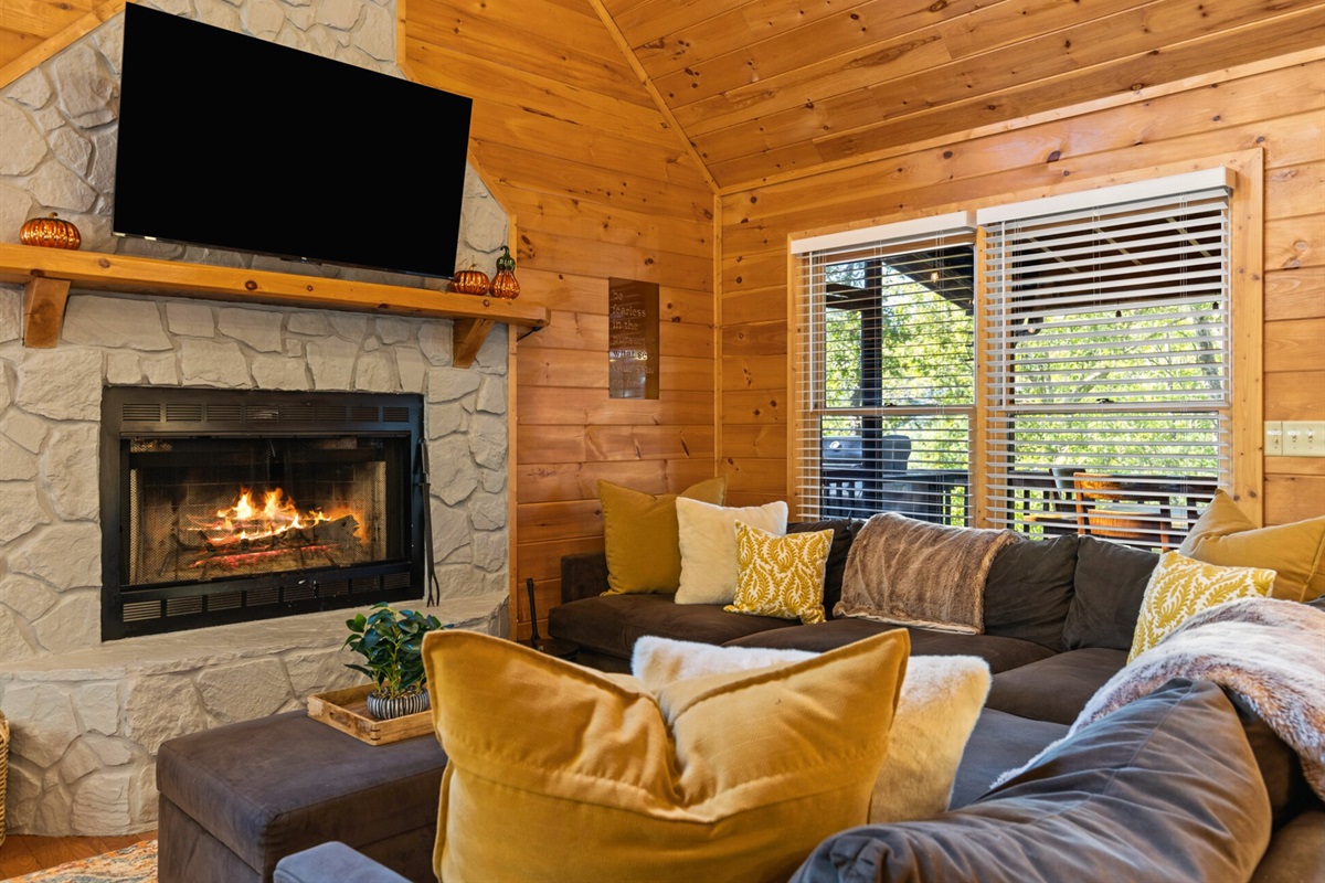 Golden flames and rustic stone, the fireplace turns every night into a cozy retreat.