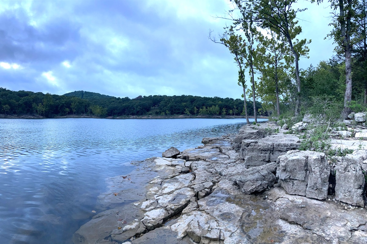 Grand Rock Formations Creating a Dramatic Landscape at the Lake's Edge