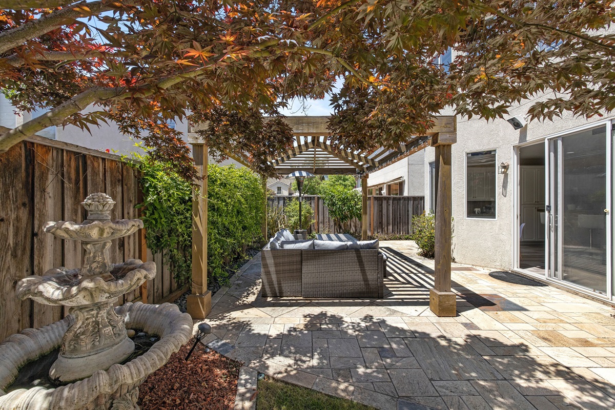Enjoy the day or night in our spacious backyard