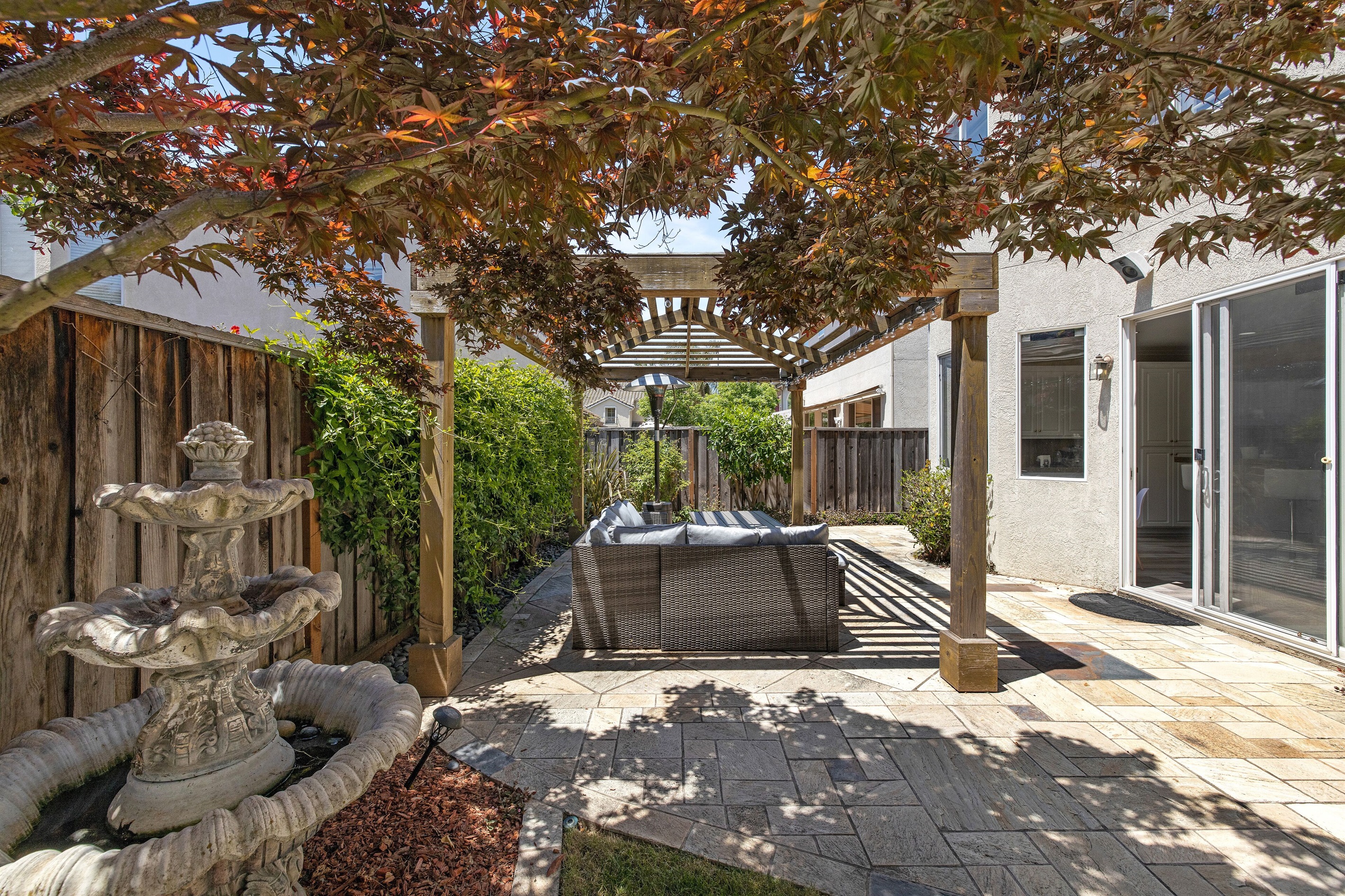 Enjoy the day or night in our spacious backyard