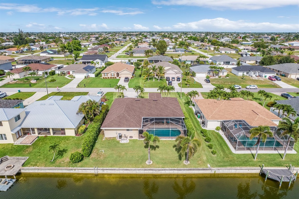 Aerial view of Villa Sirena showcasing the sparkling pool and waterfront setting!!