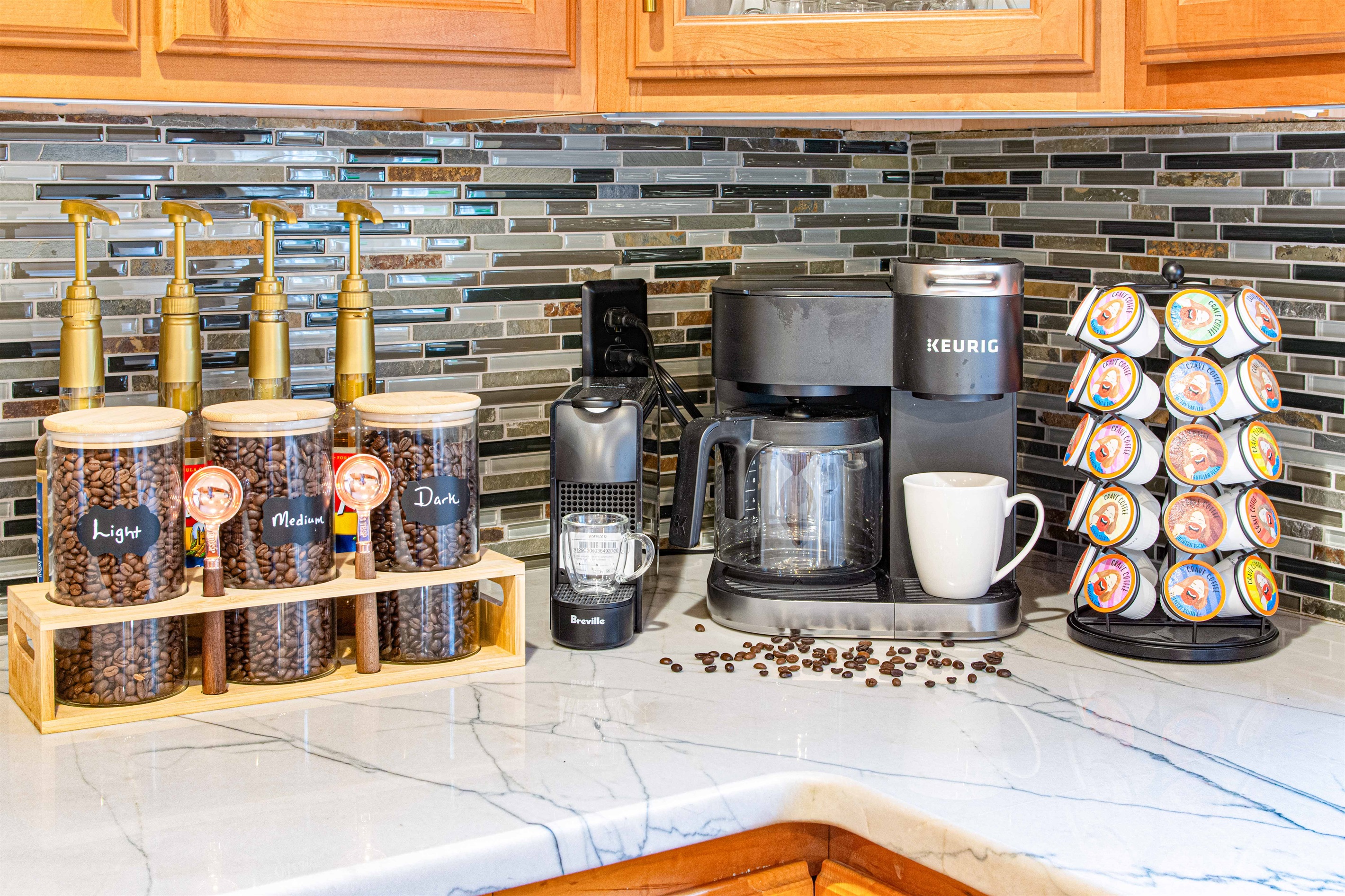 "Wake up and savor your morning routine at our fully stocked coffee bar! Featuring a variety of premium coffees, stylish mugs, and all the essentials for brewing your perfect cup, it's the ideal spot to kickstart your day and enjoy a cozy coffee break!