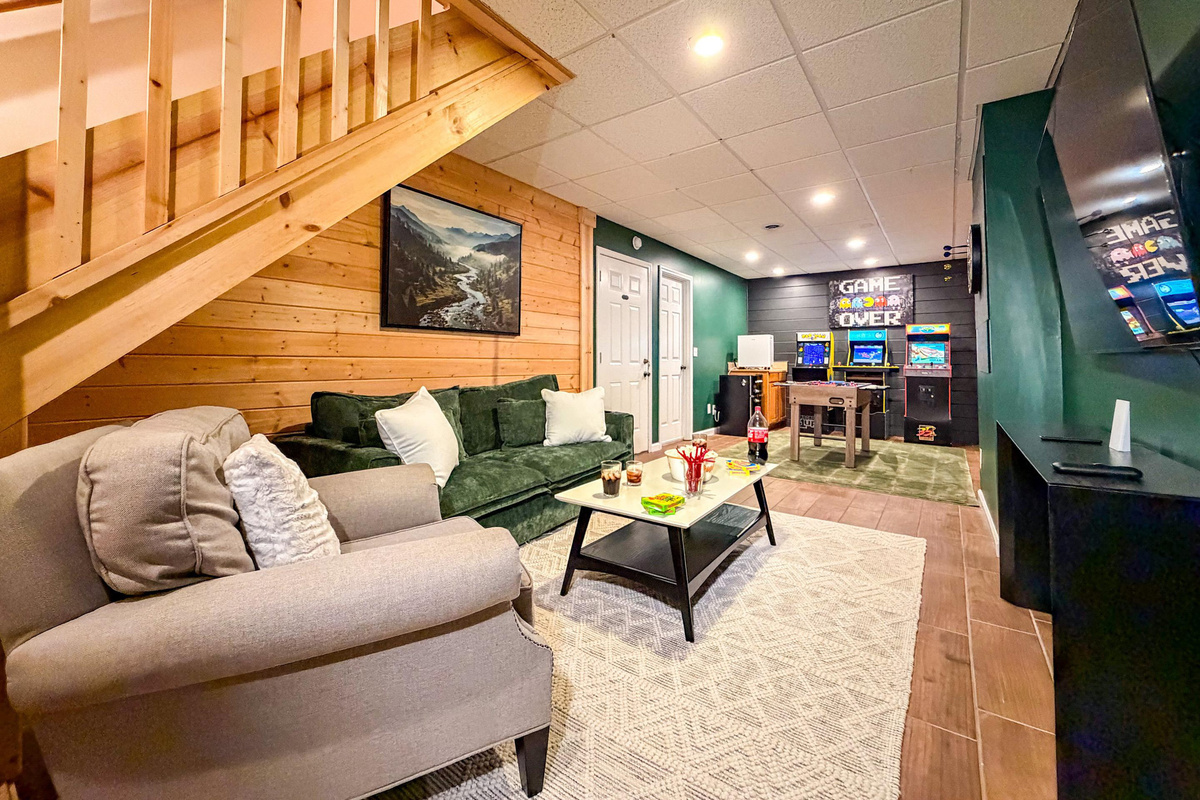 The basement features a game room, Roku TV for enjoying a good movie. 