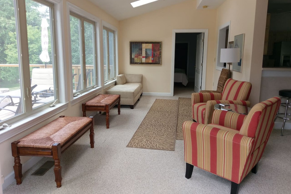 Sun room with entrance to 1st floor master.