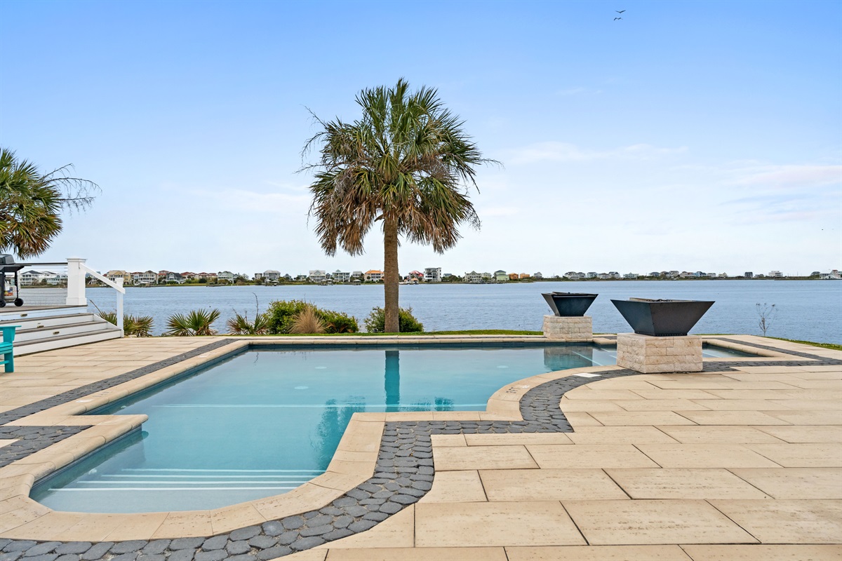 Beautiful private pool overlooking the water for the ultimate coastal retreat