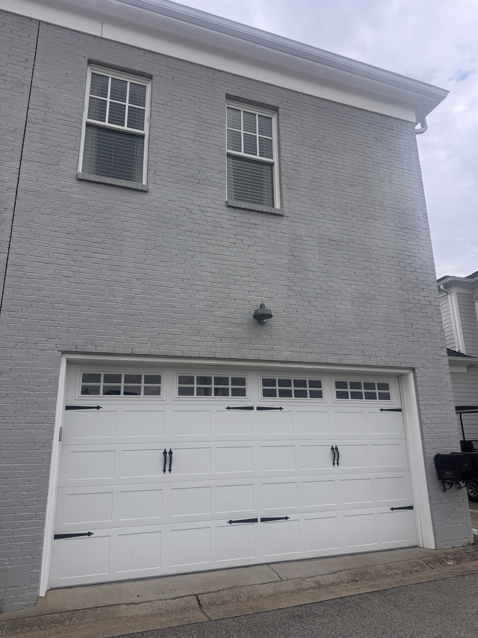 Our parking garage located on the side of the alley near the entrance of the home.