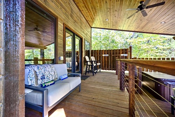 Multiple decks overlooking the pond create the ultimate setting for morning coffee or sunset drinks.