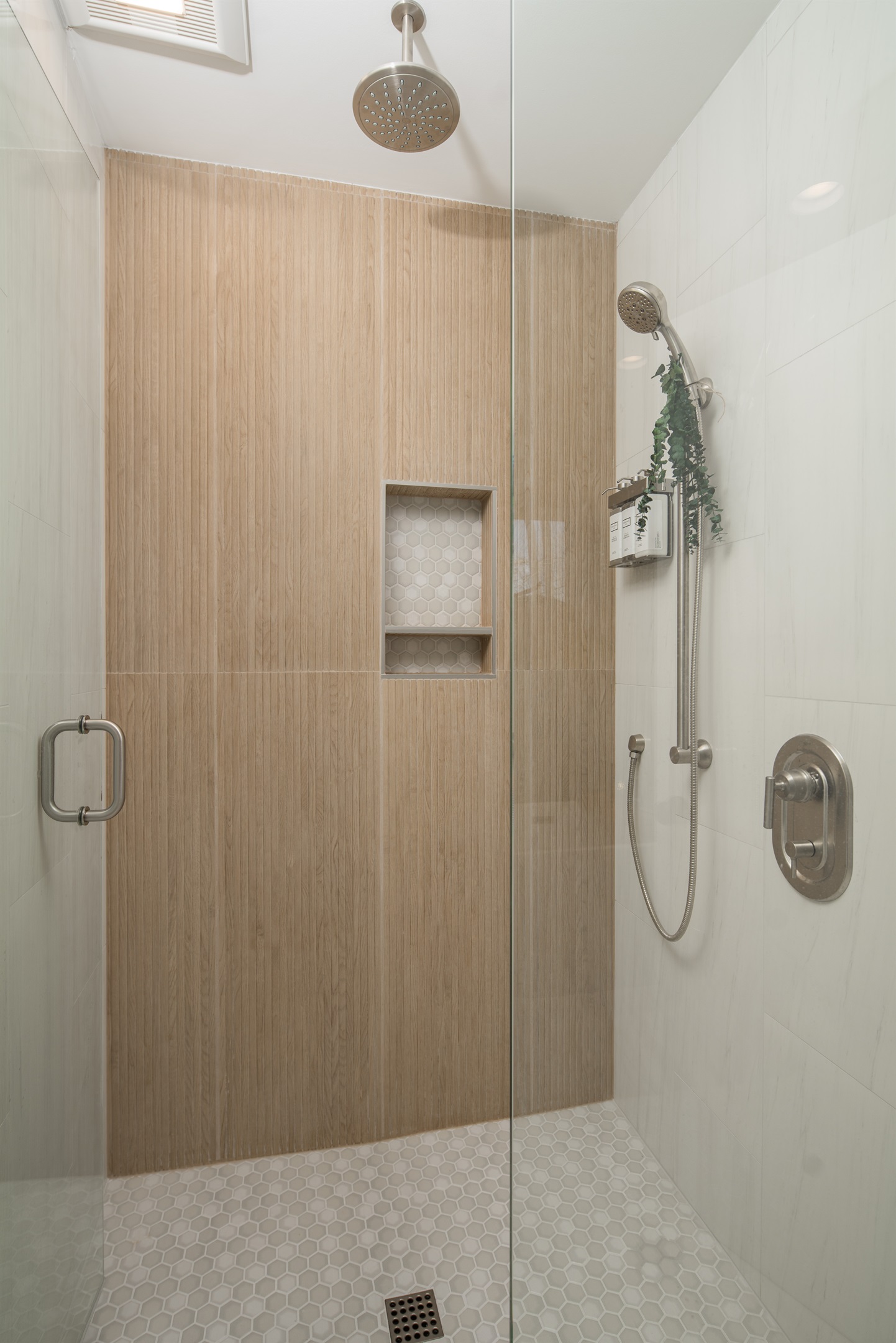 Rain shower head.  As well as a detachable hand shower, if that is preferred.  Beekman 1802 Fresh Air Shampoo, Conditioner, and body wash, available in every shower.