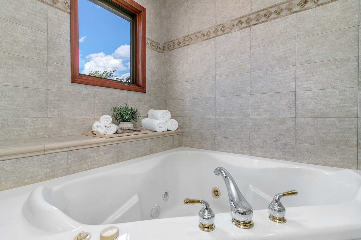 Upstairs Primary Bathroom Suite with jetted tub