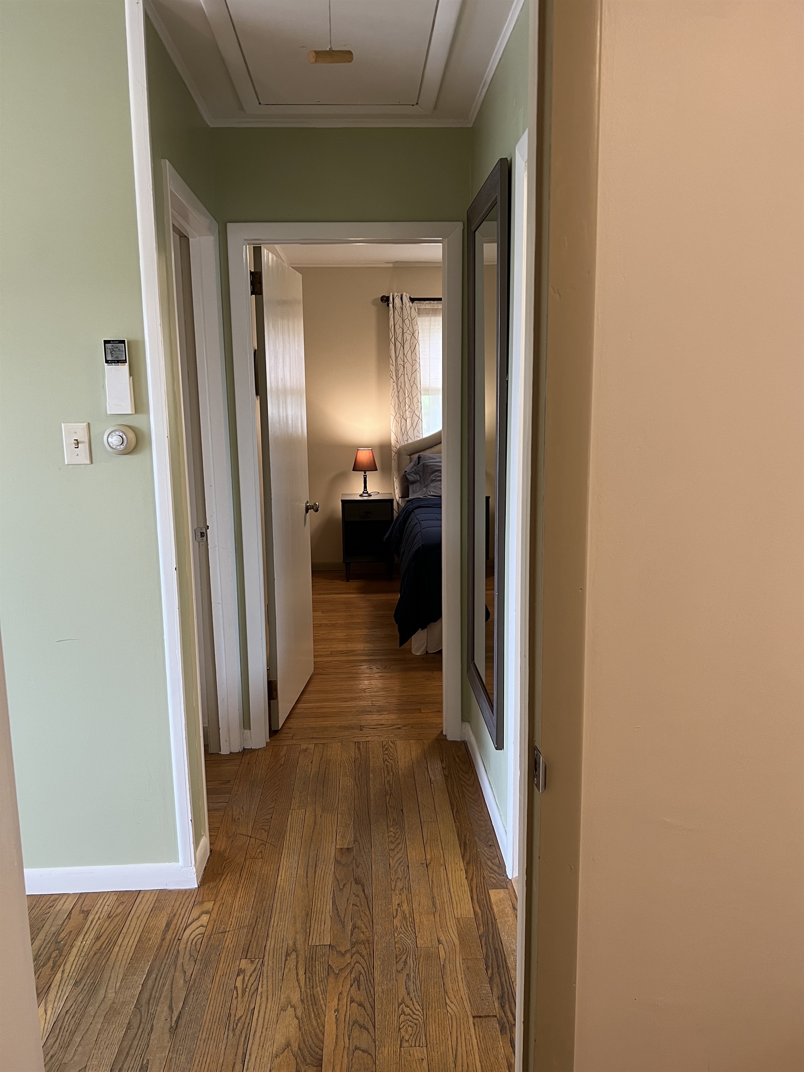 View from inside the twin bedroom, bathroom is the the right, 2 queen bedrooms to the left and  straight ahead.