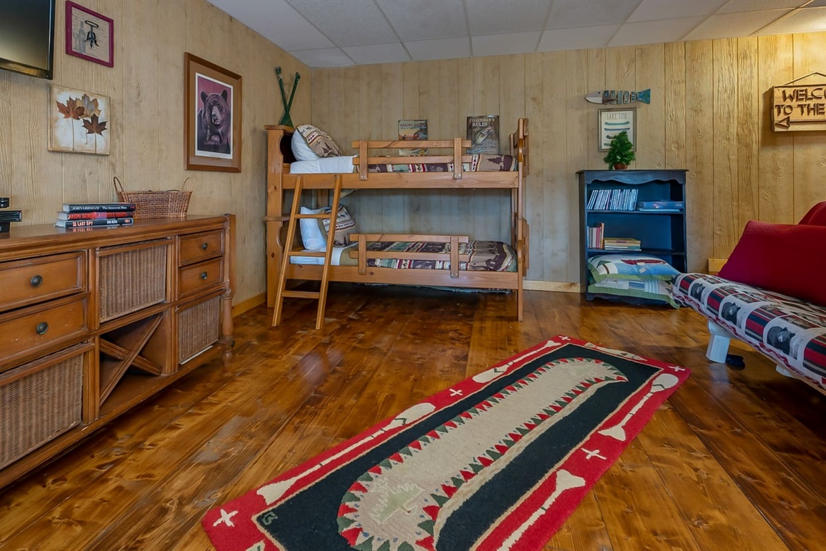 Bedroom 4 with set of bunk beds and Queen futon sleeper - downstairs, open to game room.  Gameroom opens to lower deck with seating, log swing and spectacular views!