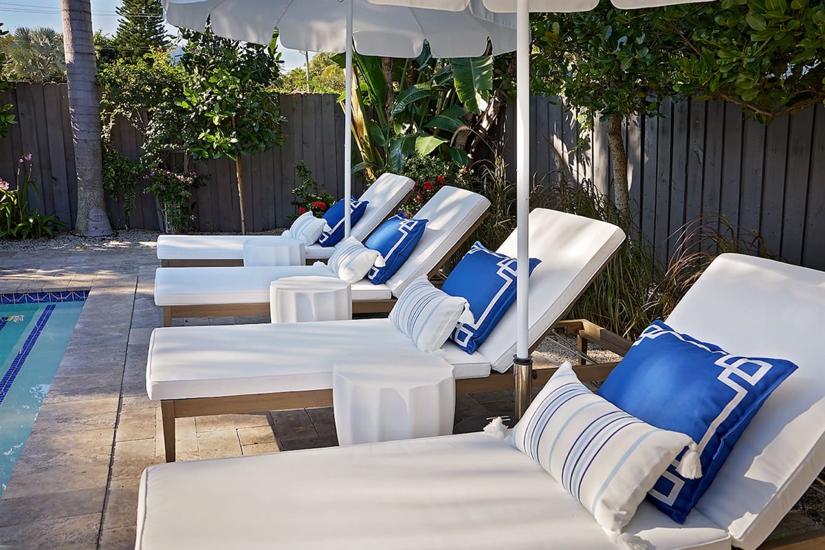 Enjoy a relaxing day by the private saltwater pool and spa, lounging in ultimate comfort on our ultra-plush lounge chairs!