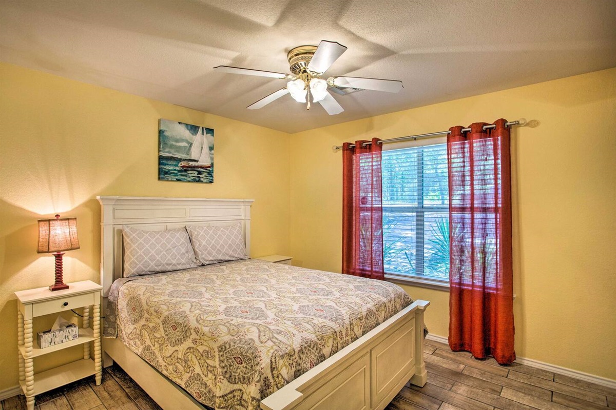 Yellow bedroom with queen size bed