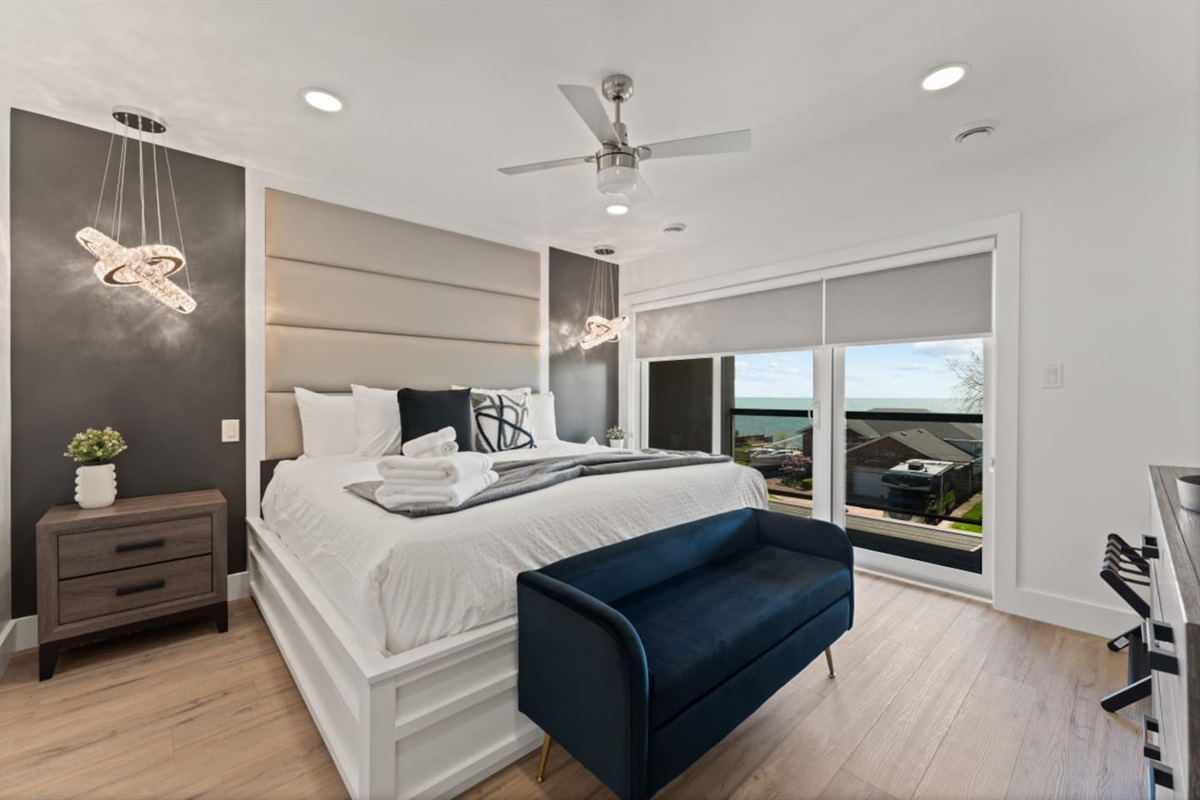 Master bedroom with King bed and private balcony.